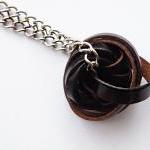 Long Pendant Necklace. Dark Brown Leather Trims...